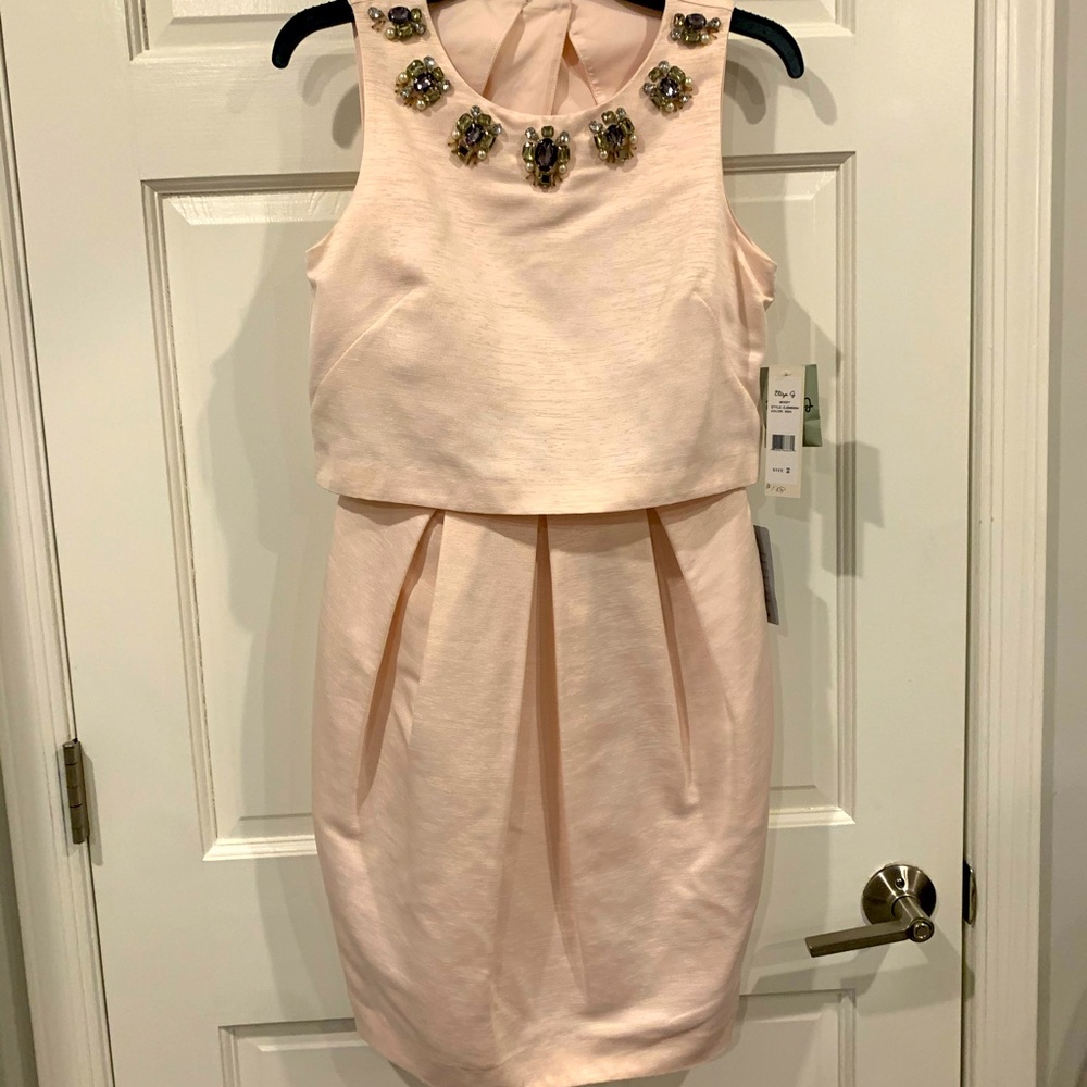 Light pink Peplum dress with embellishment